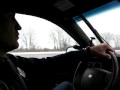 Michigan State Trooper Rod Goss on patrol during snow fall.