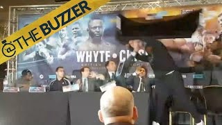 Pro boxer (Dereck Chisora) throws table at opponent at press conference | @TheBuzzer | FOX SPORTS by @The Buzzer
