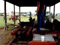 Antique Saw Mill driven by a 830 John Deere tractor
