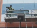 Giant painting underway over Gardiner Expressway in Toronto