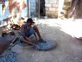 Artisans in Haiti creating \"Drum Art\"