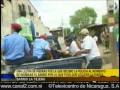 Agarran tamal en Bo. Ruben Dario, Nicaragua