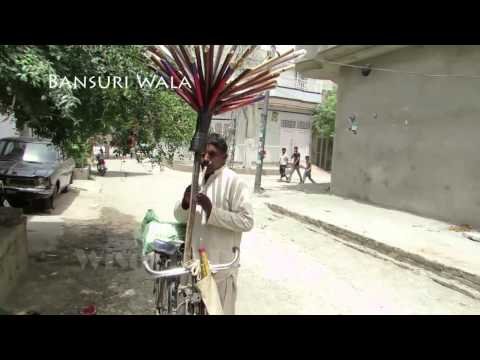 selling peace - A hardworking and Artistic Pakistani selling Bansuri (Flute) on his bicycle in Lahore Pakistan Wisdom Productions is consisting of Experienced Video Producer...