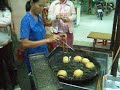 BANH' TIEU^  ... NGON va` DDONG^ KHACH' NHAT^' - VUNG~ TAU`, Loai. banh' tieu nay` nhin` thi` giong' BANH' CAM va` Tron` chu' khong^ dep. nhu cac' loai banh' tieu^ khac' va` lai. co' 1 ty' nhan^ đau^. xanh ngot. phia' ben^ trong a(n nong' khi mo*i' chien^ ra thi` ngon tuyet^. vo*i` buoi^? toi^'khi đi uong^' CAFE Ngoai` troi` (out door) goi. khoang? 20 cai' cho 4 nguoi` vua` uong^' Tra` hoac. Cafe vua` ngam' tra(ng ngoai` Bien^? nghe tien^g' song' bien^? ri` rao` gio' thoi^? nhe` nhe. dde^? quen^ het^' su. do*i` ... Vua` nham^ nhi cai' banh' Tieu^ nay` nua~ thi` qua? la` ... DDA~ LA(M' ... Xung Suong' va` hanh. phuc' thay ... Tim` Hieu^?, Mua nha`, ban' nha`, dau^` Tu Dia Oc' tai Little Saigon - California - USA xin vao` trang web cua? chung' toi^ ... http://www.VinnyTran.com