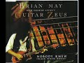 brian may playing with carmen appice's guitar zeus on the 1995 single nobody knew (black white house.)  this is the long version.

___________________________

