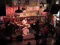 marco savo delivers a blazing guitar solo on his own tribute to tiny grimes. the night is professionally recorded and immortalized on drummer jimi bott's cd titled 