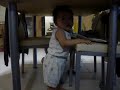 baby playing under the table