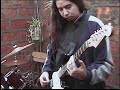 aki tocando en el patio de mi casa despues q llovio este temon,junto a la cruz de este gran grupo cristiano