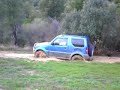 suzuki jimny bixenon vadeando fosa embarrada