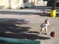 Liam bouncing a baskeball