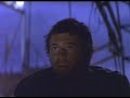 This is most likely an international trailer for Mad Max 2, having an American voice over, yet retaining the Mad Max 2 title - the film was titled 