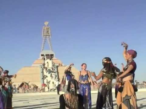 markdayresponse - Burning Man belly dance at the foot of the Man in 2003.