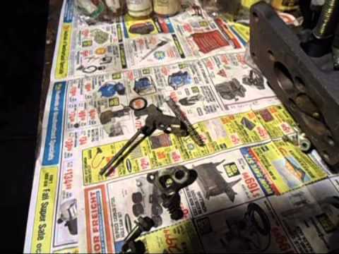 how to put a carburetor back together