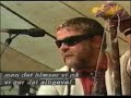 archive footage of the vindscreen vipers skiffle group at t�nder festival, denmark, 1984. tich frier (guitar and vocals), brian miller (mandolin), bill hill (guitar & vocals), danny kyle (tea chest bass & vocals) & mike whellans (drums)