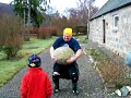 Bill Crawford lifts the Inver Stone