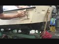 Storm Force cleaning back of boat