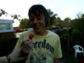 Crazy boy eating a very hot scotch bonnet chilli pepper! Crazy boy eating a very hot scotch bonnet chilli pepper!