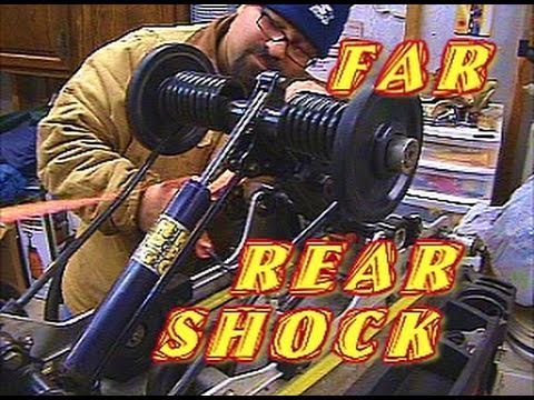 how to rebuild snowmobile shocks
