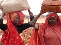 Why Are These Women Carrying Stoves On Their Heads?