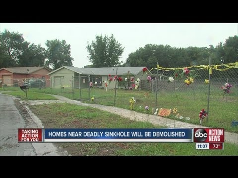 homes - Crews will demolish two Seffner homes located on either side of a deadly sinkhole. The wrecking ball is scheduled for Friday morning.