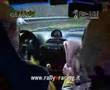 Co-driver reading newspaper