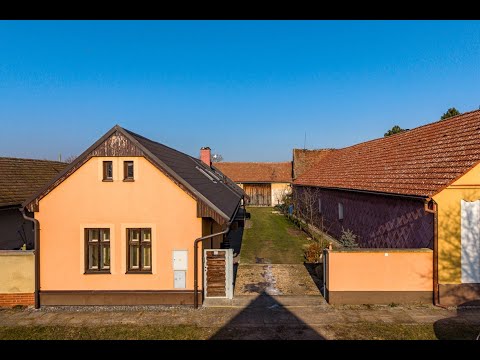 Video Rodinný dům se zahradou v klidné části obce Opolany – Kanín