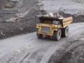 Cat 777d in opencast  hauling waste products