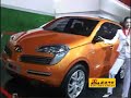 Beautiful blond girl and Chery auto\