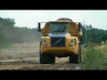 Volvo A30D and Caterpillar trucks