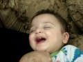 baby laughing really loud in his sleep