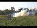 videos de two pounds of tannerite vs barrel