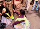 tibetan women storm in front of chinese embasy