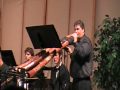 Todd Johnson premiers Didj: Concerto for Didjeridu with the Oregon Wind Ensemble, composed by Sean Wagoner. Patricia Cardona principal flue/bass flute, Cassie Lear and Haley Camerson piccolo/flute, Ella Anderson and Lacy Chrisco flutes. Mvt. 2 is essentailly a soliloquy for the didjeridu. Todd composed a 6:30 min. solothat was transcribed and supported with a percussion quartet. This quartet simultaneously accompanies, mimics, foreshadows, and responds to, the various colors and effects of the didjeridu solo, even the soloist's breathing. www.patriciacardona.com