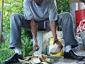 Slicing with a sharp knife in Jamaica Slicing with a sharp knife in Jamaica