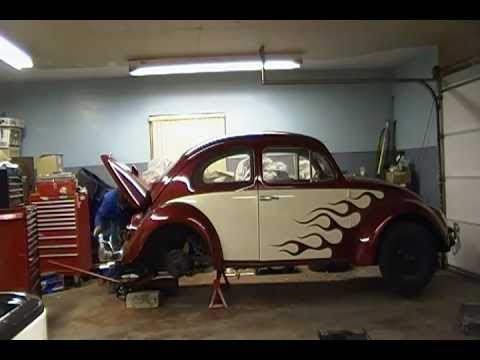 How to install an engine in a VW beetle in three and a half minutes, by yourself.