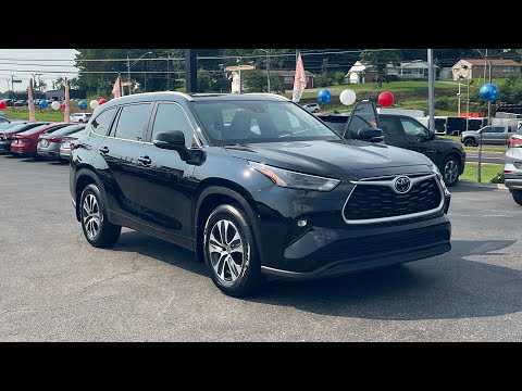 Used 2024 Midnight Black Metallic Toyota XLE image 1