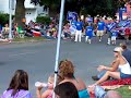 brian davis walking in the 2008, july 4th parade in blooming prairie.