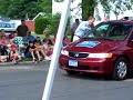brian davis walking in the 2008, july 4th parade in blooming prairie.