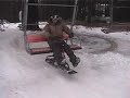 chairlift with snowmoto