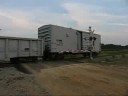 as i awaited the arrival of ns 15m the ns youngstown line dispatcher was heard setting up a meet between another unknown eastbound, the 15m (westbound) and a work train.  a headlight appeared in the distance and along came a train identifying itself as what sounded like 