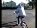Asian boy learns how to ride bike