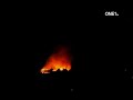 earthquake japan 2011 oil refinery on fire in japan, buildings on fire