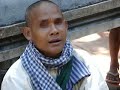 Blind beggar singer in Phnom Kulen, Cambodia