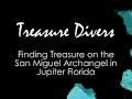 scuba divers finding treasure on the spanish galleon san miguel archangel off jupiter beach florida in october 2006 with seahunter. the coin found was a silver 8 reale. treasure divers!