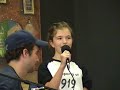 A 10 year old singer showing up her brother at his CD release party...