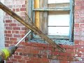 Removing Bars Secured to a Wood Frame
