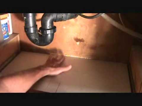 how to find a leak under kitchen sink