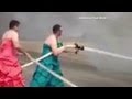 Firefighters in drag put out fire