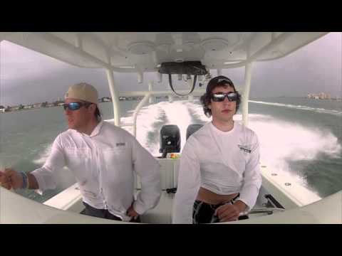 Yellowfin Yachts - Running a 32' Yellowfin in Big Pass, Sarasota, the day before Thanksgiving as a storm front chased us in from catching Spanish Mackerel chowing down on the b...