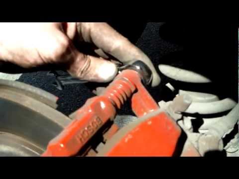 how to replace the rear brake pads on a 2007 toyota corolla verso